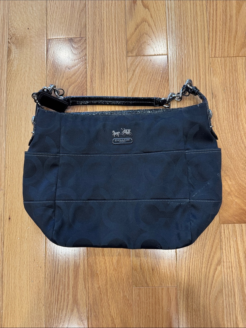 Coach hobo style shoulder bag in black signature "Op Art” print